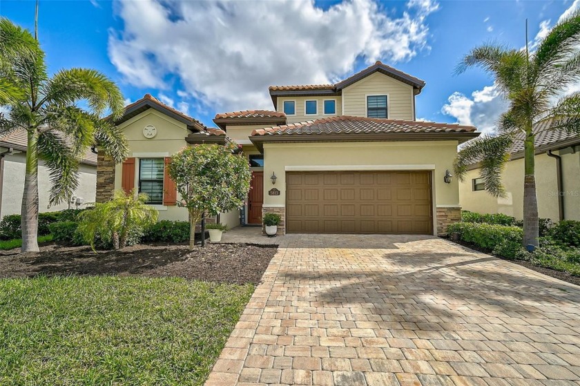 Nestled within the prestigious Lakewood National Golf Club - Beach Home for sale in Bradenton, Florida on Beachhouse.com