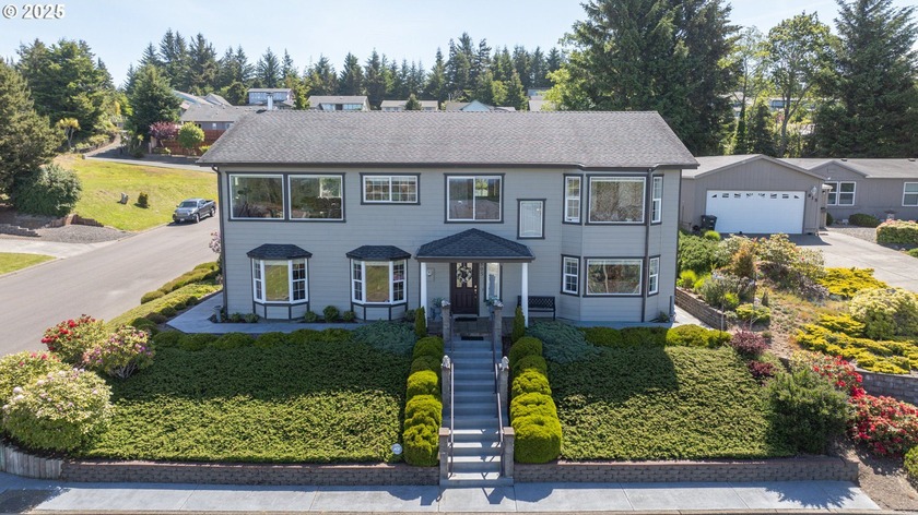 Pristine Home & Shop with Stunning Views! Nestled in a - Beach Home for sale in Coos Bay, Oregon on Beachhouse.com
