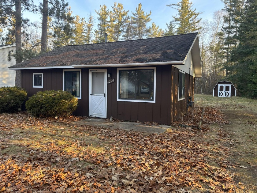 Cozy two bedroom 1 bath with TWO deeded lake accesses! Hop on - Beach Home for sale in Oscoda, Michigan on Beachhouse.com