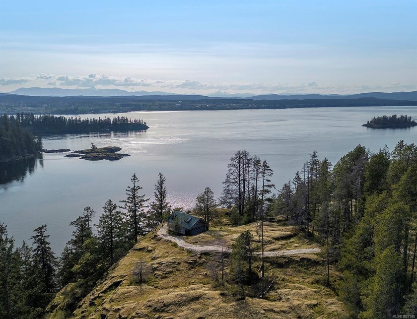 Discover the beauty and potential of island living on this - Beach Lot for sale in Quadra Island, BC on Beachhouse.com