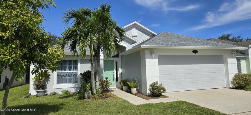 Lovely lakefront home  NEW ROOF 2023, NEW Garage Hurricane Door - Beach Home for sale in Melbourne, Florida on Beachhouse.com