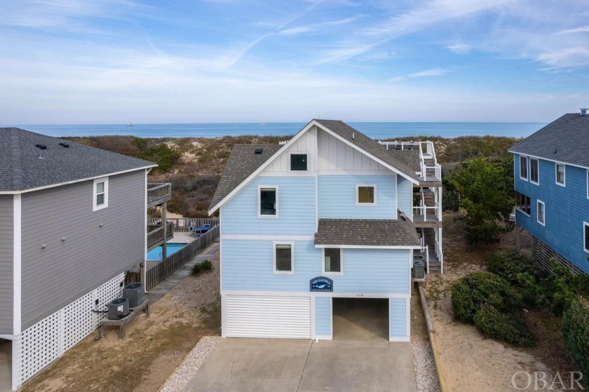 Welcome to your coastal sanctuary, a stunning oceanfront home - Beach Home for sale in Corolla, North Carolina on Beachhouse.com