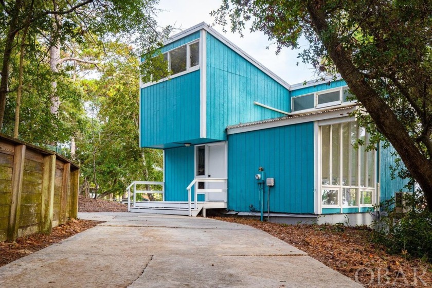 Affordable, modern, upgraded and soundfront! This home sits on - Beach Home for sale in Kill Devil Hills, North Carolina on Beachhouse.com