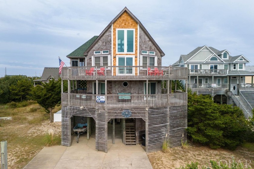 This coastal 5-bedroom oasis with a private heated saltwater - Beach Home for sale in Waves, North Carolina on Beachhouse.com