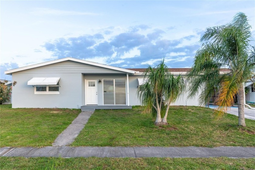 Live the Florida dream in this completely renovated GULF ACCESS - Beach Home for sale in North Port, Florida on Beachhouse.com