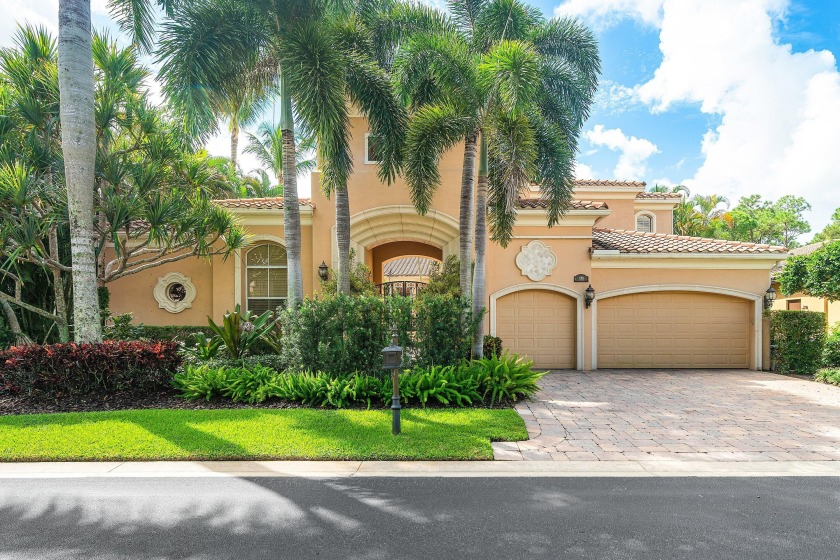 This stunning and meticulously maintained two-story courtyard - Beach Home for sale in Palm Beach Gardens, Florida on Beachhouse.com