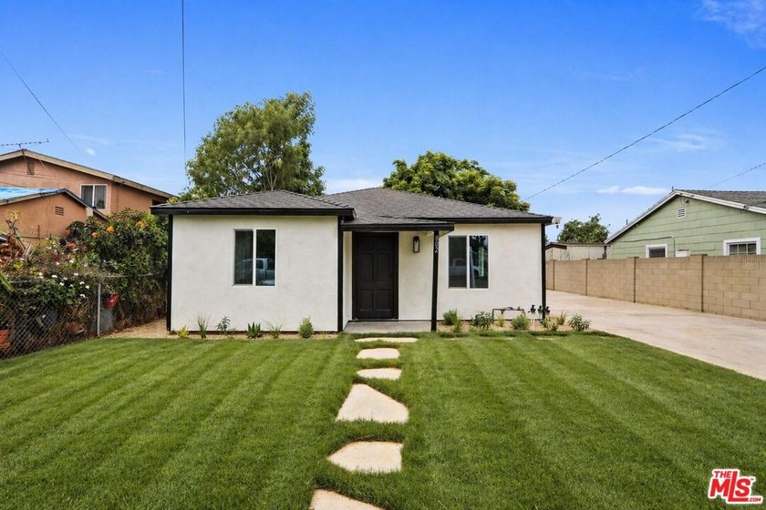 Fully remodeled and move-in ready, this beautifully upgraded - Beach Home for sale in Santa Ana, California on Beachhouse.com