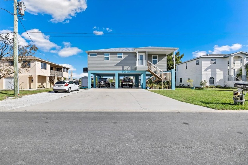 A stunning elevated POOL home, built in 2022, 3 bedrooms and 2 - Beach Home for sale in Hernando Beach, Florida on Beachhouse.com