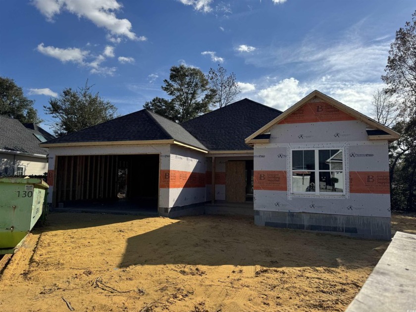 Discover this stunning 3 bedroom 2.5 bath custom home in the - Beach Home for sale in Little River, South Carolina on Beachhouse.com