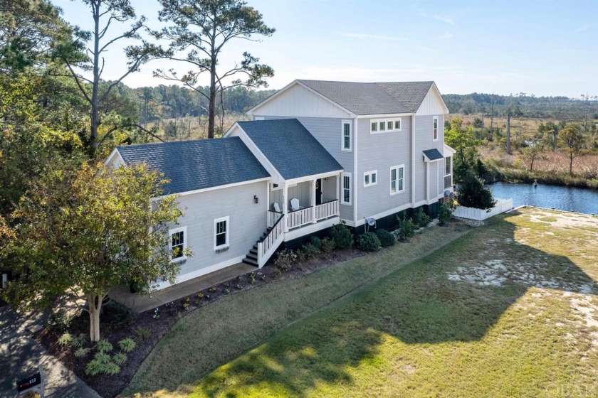 Nestled on a private, corner lot in the Cypress Cove Community - Beach Home for sale in Manteo, North Carolina on Beachhouse.com