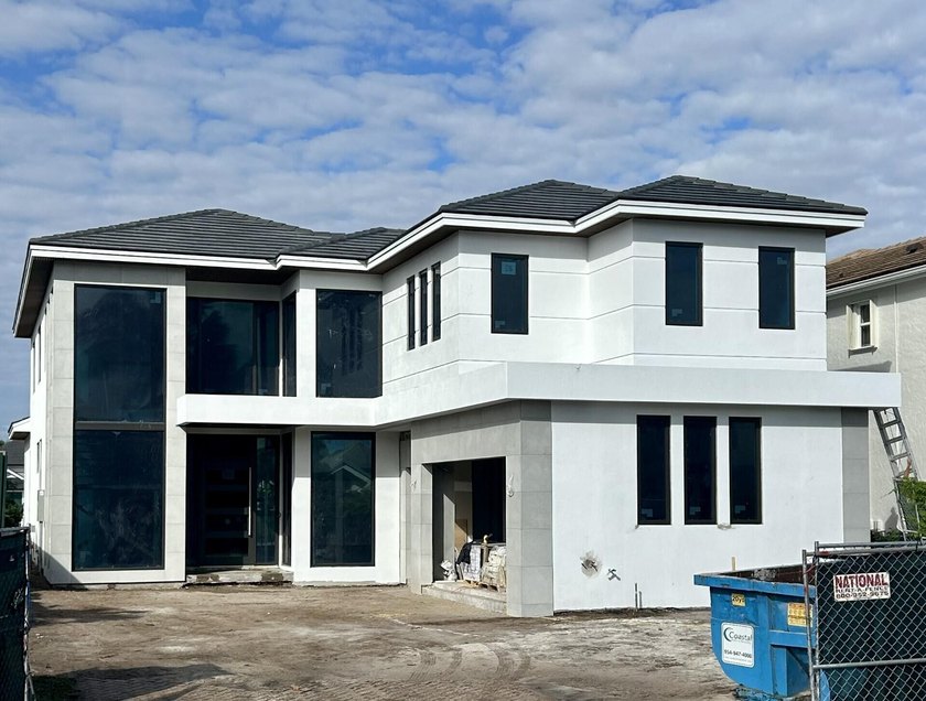 This newly constructed 3,800 sq ft Modern/Transitional lakefront - Beach Home for sale in Palm Beach Gardens, Florida on Beachhouse.com