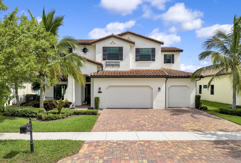 This Oasis is located in the private and gated community Palm - Beach Home for sale in Boynton Beach, Florida on Beachhouse.com