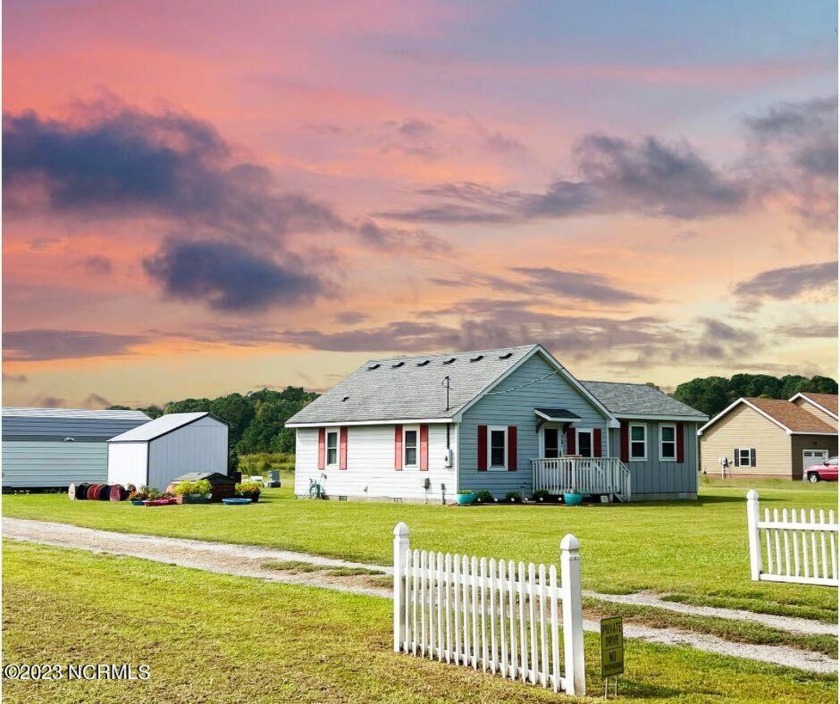 Welcome to the cutest country bungalow you've ever seen! This - Beach Home for sale in Aydlett, North Carolina on Beachhouse.com