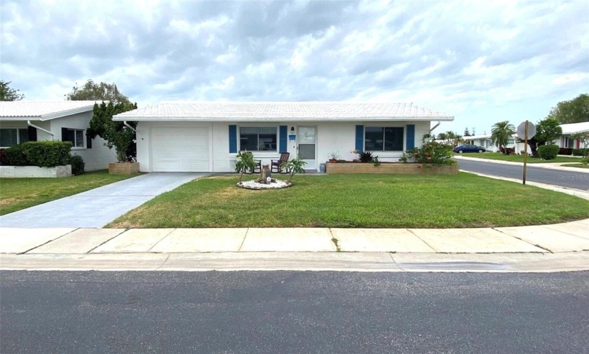 This 2 bedroom 1.5 bath home is located in the 55+ COMMUNITY of - Beach Home for sale in Pinellas Park, Florida on Beachhouse.com