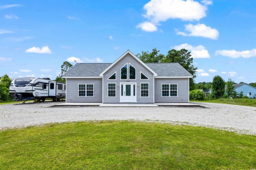 CHARMING, FULLY UPDRADED COUNTRY RETREAT ON A MASSIVE 2+ ACRE - Beach Home for sale in Little River, South Carolina on Beachhouse.com