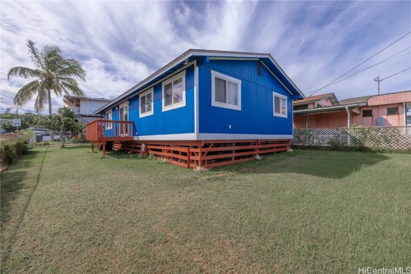 Welcome to this charming 3-bedroom, 1-bath home located on a - Beach Home for sale in Kahuku, Hawaii on Beachhouse.com