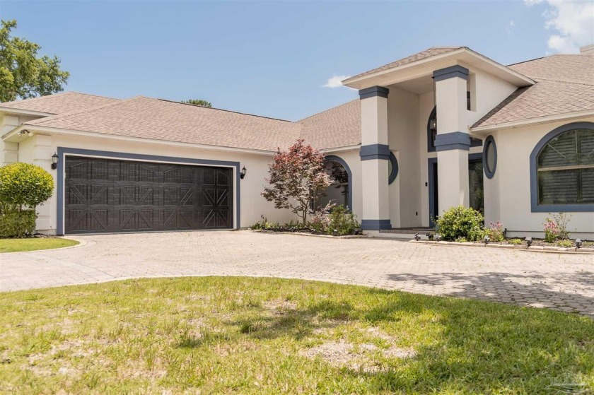 Welcome to STONEBROOK GOLF VILLAGE; A sought-after gated - Beach Home for sale in Pace, Florida on Beachhouse.com