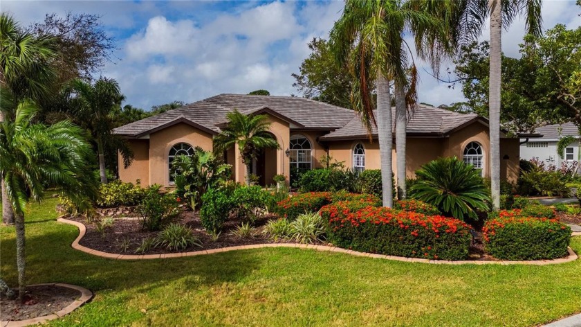 This exquisite partially turn-key furnished OVERSIDED POOL home - Beach Home for sale in Nokomis, Florida on Beachhouse.com