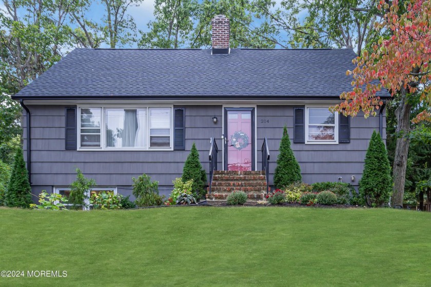 Welcome to this beautifully maintained Cape nestled in the - Beach Home for sale in Neptune, New Jersey on Beachhouse.com