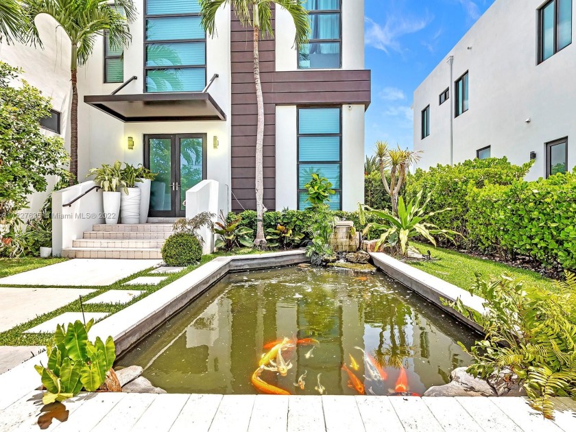 Located in exclusive and gated Sans Souci Estates known as North - Beach Home for sale in North  Miami, Florida on Beachhouse.com