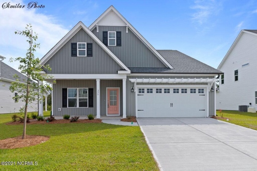 Be wow'd by this Madison floor plan by American Homesmith in - Beach Home for sale in Hampstead, North Carolina on Beachhouse.com