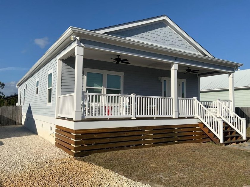 EMBRACE EASY LIVING IN THIS BEAUTIFULLY DESIGNED, FULLY - Beach Home for sale in Port St Joe, Florida on Beachhouse.com