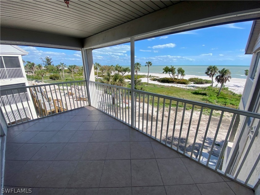 Immerse yourself in the panoramic splendor of the Gulf from this - Beach Condo for sale in Sanibel, Florida on Beachhouse.com