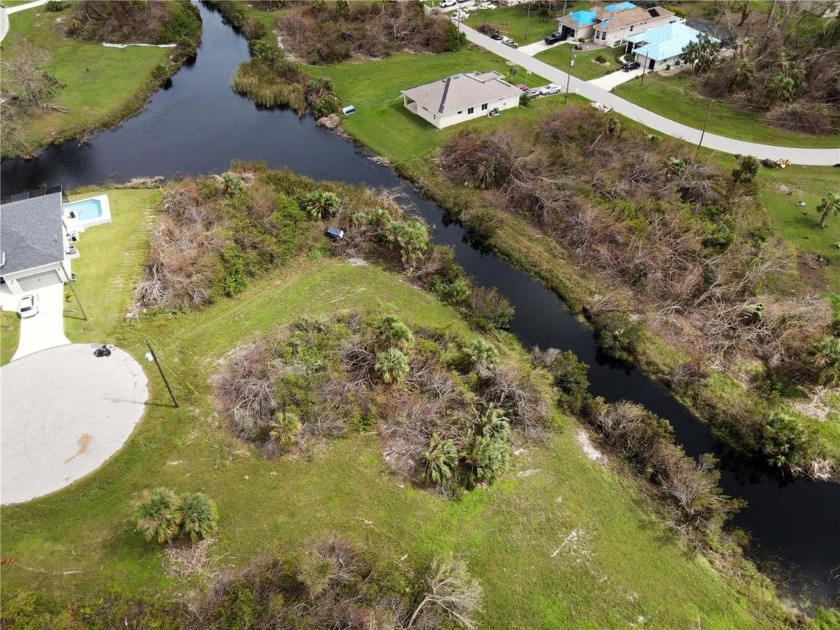 Don't miss out on this OVERSIZED, CANAL-FRONT Rotonda Lakes lot - Beach Lot for sale in Rotonda West, Florida on Beachhouse.com