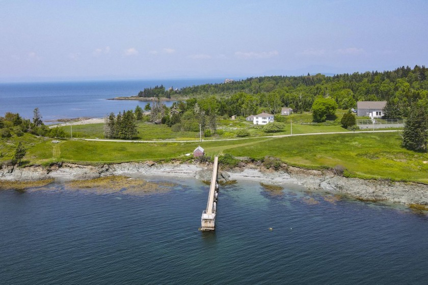 With over 1,000 feet of striking oceanfront, including a - Beach Home for sale in North Haven, Maine on Beachhouse.com