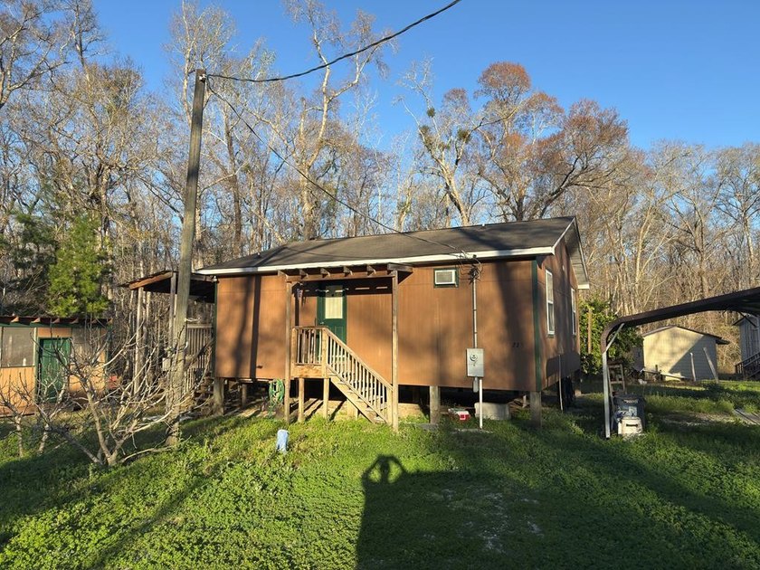 Turn Key cabin that is furnished less than 1500 feet from - Beach Home for sale in Wewahitchka, Florida on Beachhouse.com