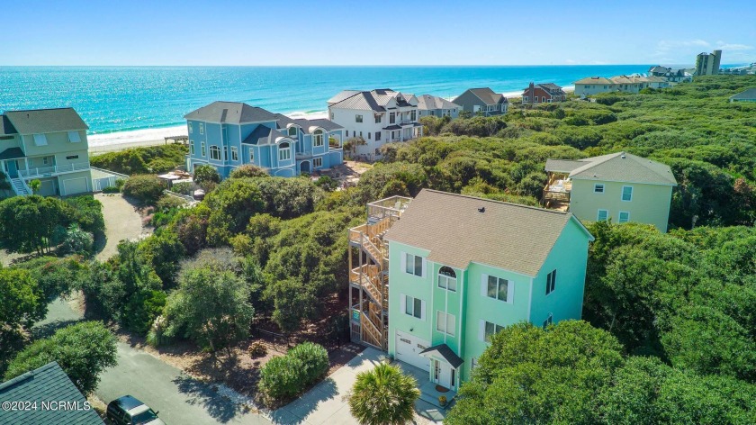 This captivating oceanfront property nestled in the Maritime - Beach Home for sale in Indian Beach, North Carolina on Beachhouse.com