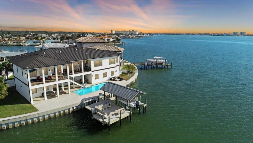 Discover unparalleled privacy and waterfront living in this - Beach Home for sale in Seminole, Florida on Beachhouse.com