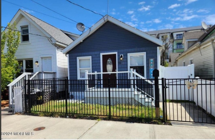 Discover the perfect Jersey Shore getaway with this inviting - Beach Home for sale in Keansburg, New Jersey on Beachhouse.com