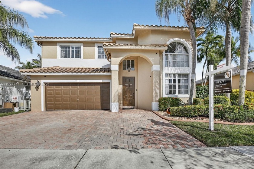 Located in the highly desirable gated community of Pembroke - Beach Home for sale in Pembroke Pines, Florida on Beachhouse.com