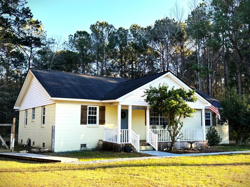 This One Story 5 bedroom, 2 bath home is situated on a large lot - Beach Home for sale in Awendaw, South Carolina on Beachhouse.com