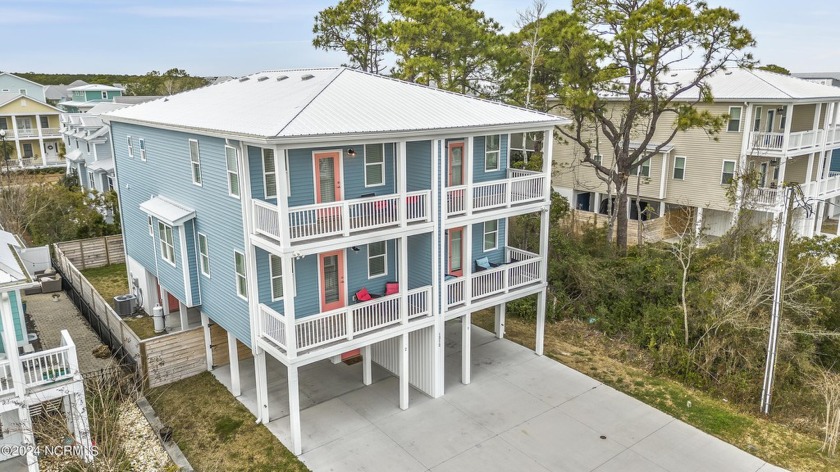 Looking for an affordable coastal retreat with a proven rental - Beach Townhome/Townhouse for sale in Carolina Beach, North Carolina on Beachhouse.com