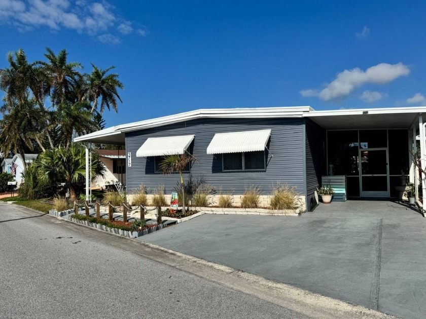 Spacious and beautifully renovated, this 3-bedroom, 2-bathroom - Beach Home for sale in Tampa, Florida on Beachhouse.com