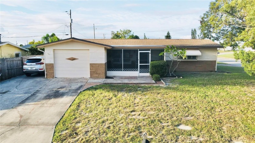 *Seller offering $2,000.00 credit for flooring* Welcome to this - Beach Home for sale in Holiday, Florida on Beachhouse.com