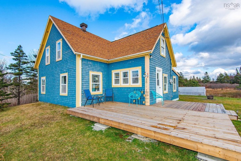 This charming 4-bedroom home combines rustic character with - Beach Home for sale in Mavillette,  on Beachhouse.com