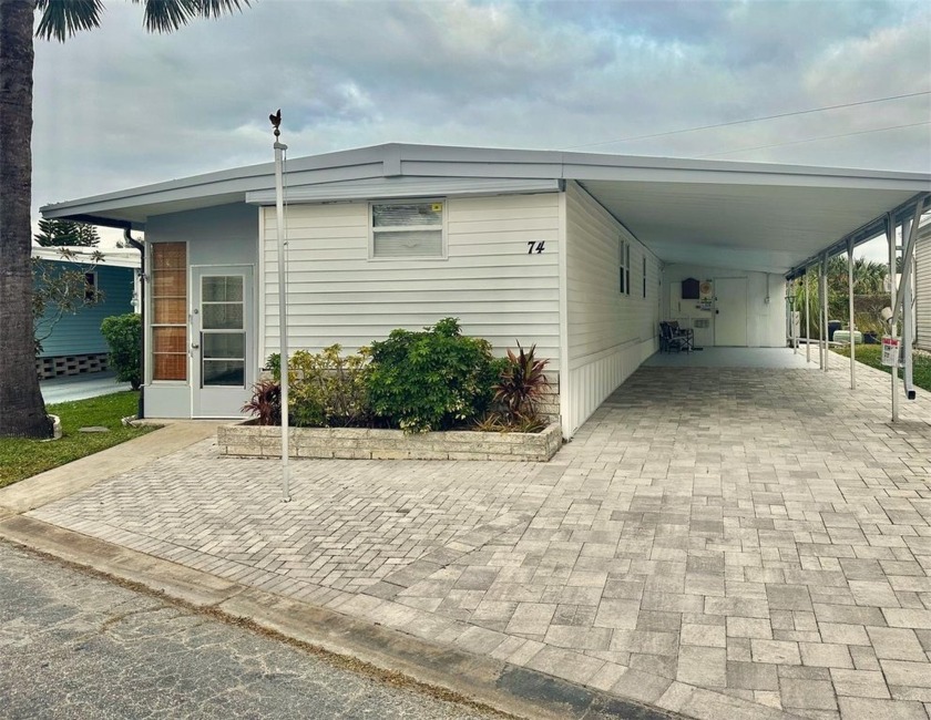 Hurry to See this inviting 896 sq. ft.  2 bedroom, 1 bath, with - Beach Home for sale in Pinellas Park, Florida on Beachhouse.com