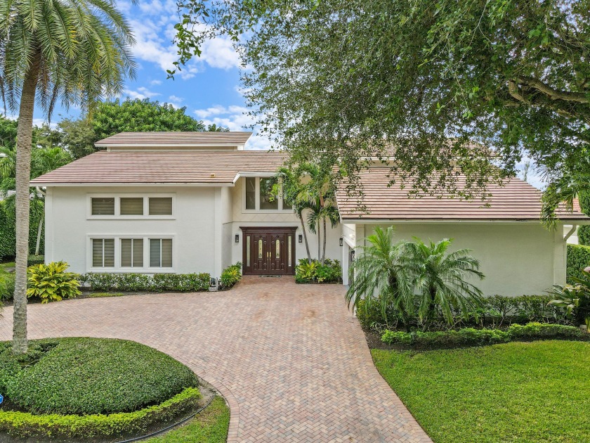A private sanctuary on an oversized homesite, this custom - Beach Home for sale in West Palm Beach, Florida on Beachhouse.com