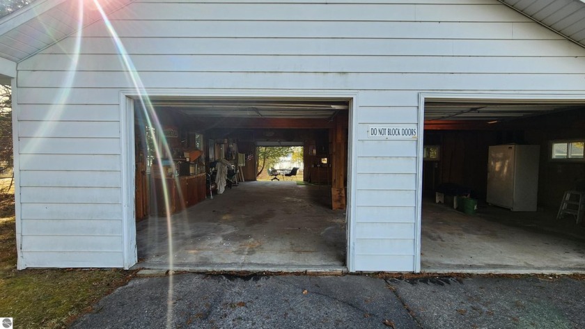 Torch Lake is the settig for this 36' x 36' garage with 12' x - Beach Lot for sale in Alden, Michigan on Beachhouse.com