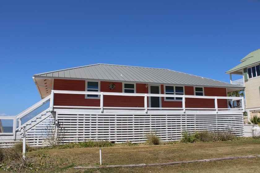 Enjoy breathtaking sunsets over the Bay from this well- - Beach Home for sale in St. George Island, Florida on Beachhouse.com