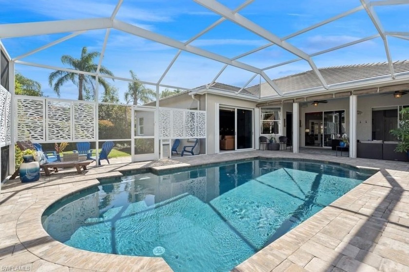 Step into this single-story, 4-bedroom saltwater pool home in - Beach Home for sale in Fort Myers, Florida on Beachhouse.com