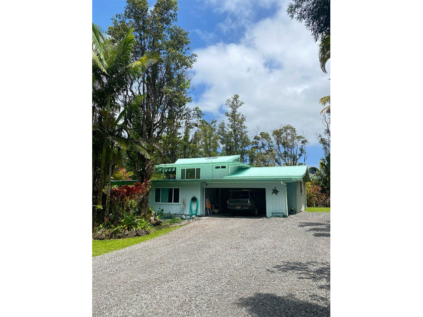 Nestled among towering palms & vibrant tropical foliage, this - Beach Home for sale in Pahoa, Hawaii on Beachhouse.com