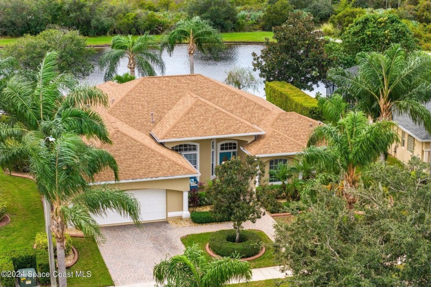 Welcome to 1517 Auburn Lakes Drive, a beautifully landscaped - Beach Home for sale in Rockledge, Florida on Beachhouse.com