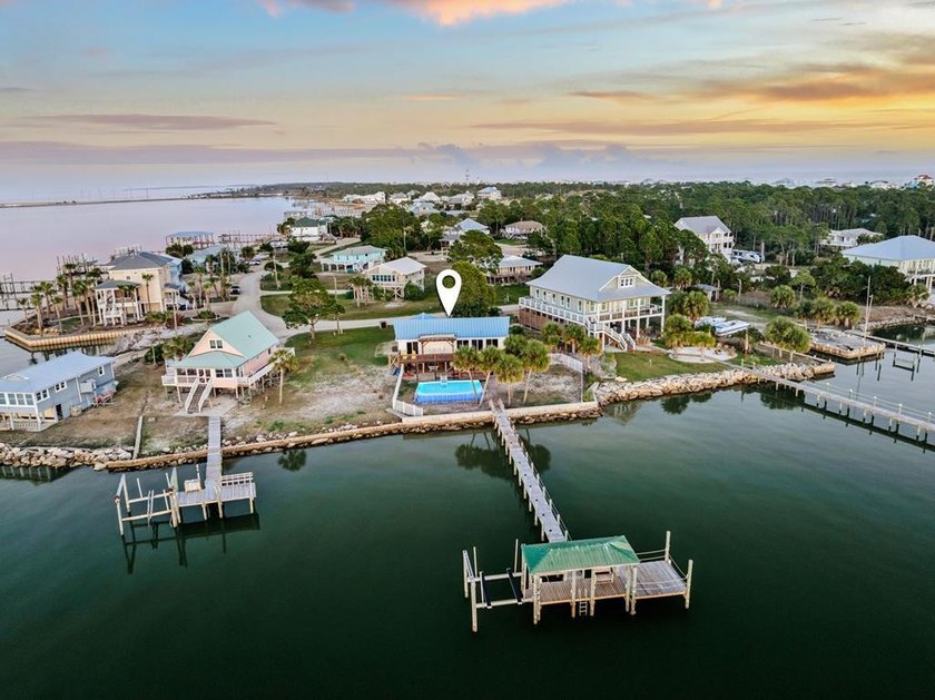 Money Maker! Recently updated! Get ready for summer! Bay front - Beach Home for sale in St. George Island, Florida on Beachhouse.com