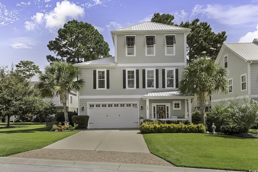 This stunning 4-bedroom, 4.5 bath raised beach home in the - Beach Home for sale in Murrells Inlet, South Carolina on Beachhouse.com