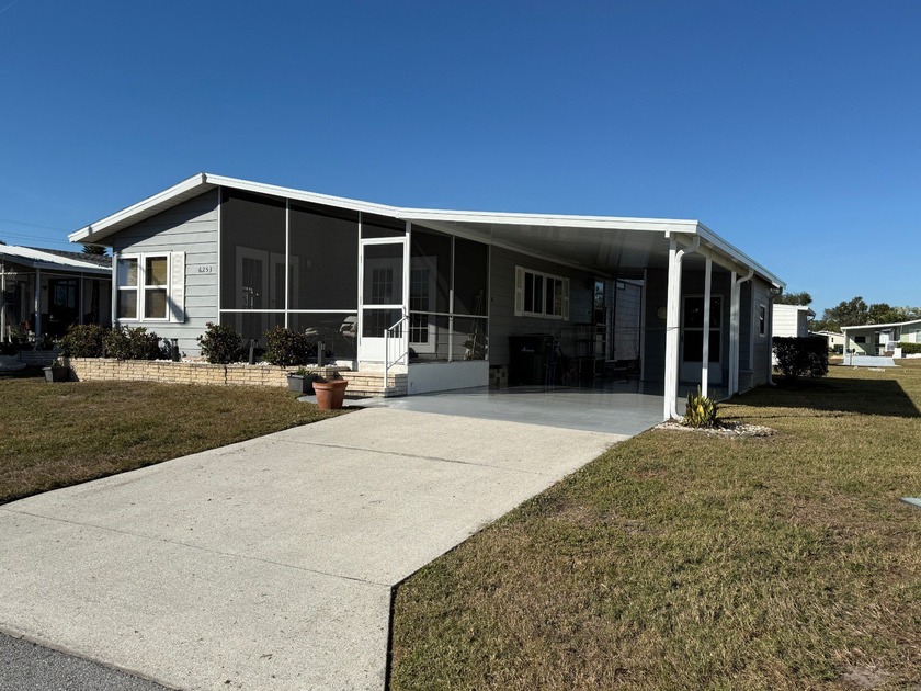 THIS HOME IS ON LEASED LAND WITH AN APPROXIMATE MONTHLY LOT - Beach Home for sale in Sarasota, Florida on Beachhouse.com