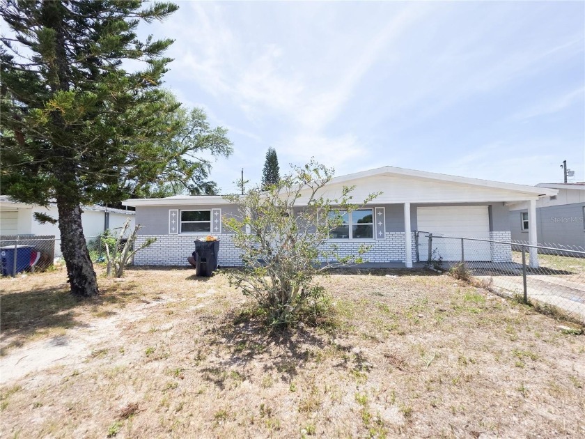 Under contract-accepting backup offers. A beautifully upgraded - Beach Home for sale in Holiday, Florida on Beachhouse.com